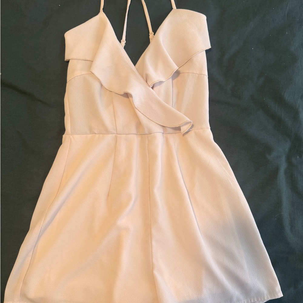 Elegant Cream Sleeveless Romper with Cross Back Adjustable Straps